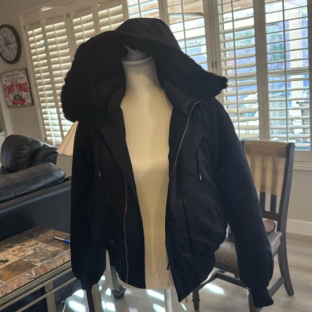 Black short puffer jacket